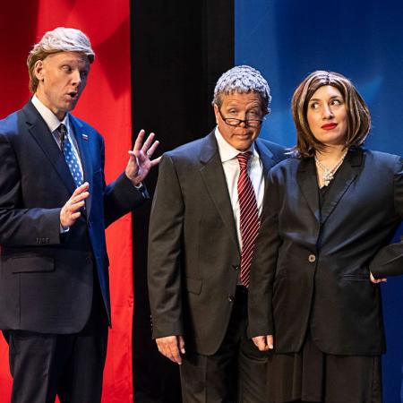 Three members of Capitol Fools on stage in character