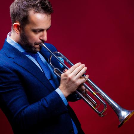 Benny Benack III playing the trumpet