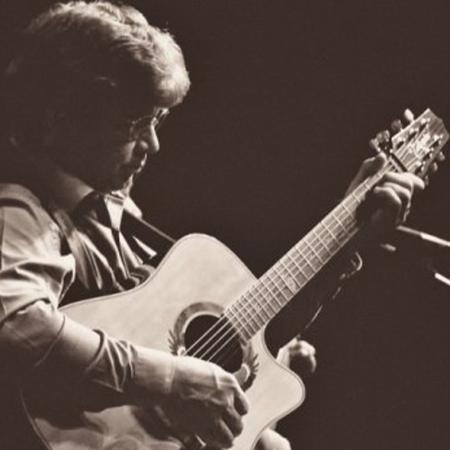 Jim Curry on guitar in tribute to John Denver