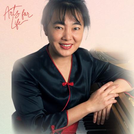 Tien Hsieh at the piano in a black top.