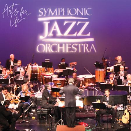 Symphonic Jazz Orchestra on the Carpenter Center stage with their logo projected on a screen behind them.