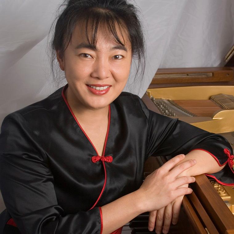 Tien Hsieh seated at the piano